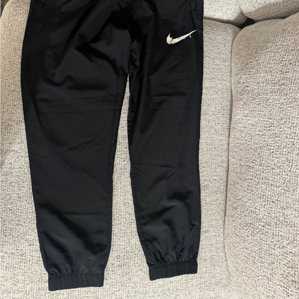 Nike Black Track Pants with White Swoosh